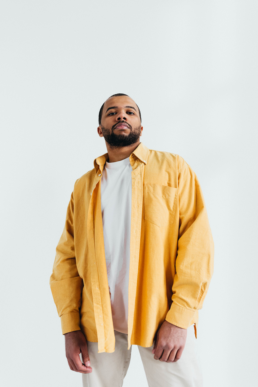 A Bearded Man in Yellow Long Sleeve Shirt